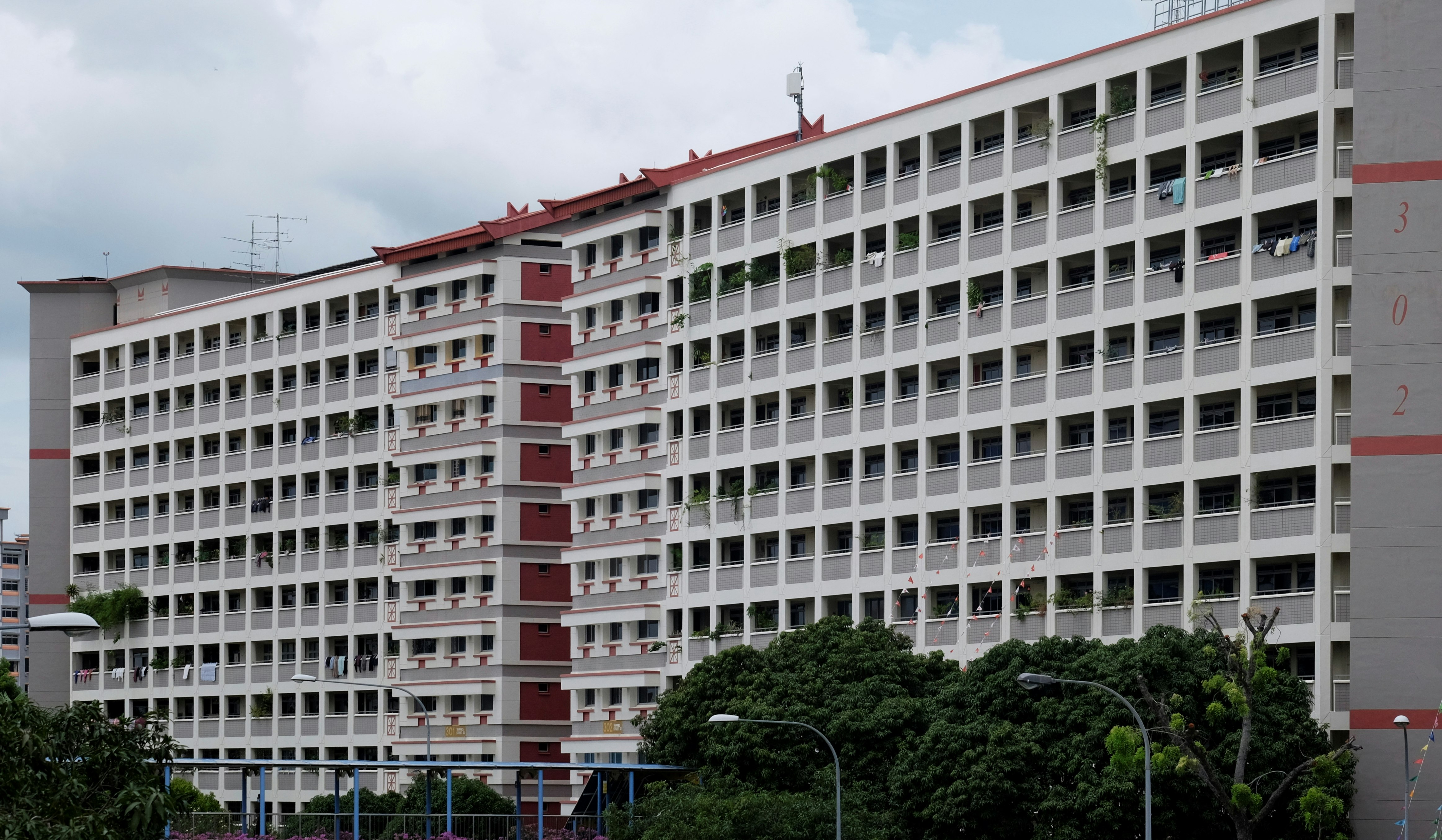 White and red concrete building under total facilities management
